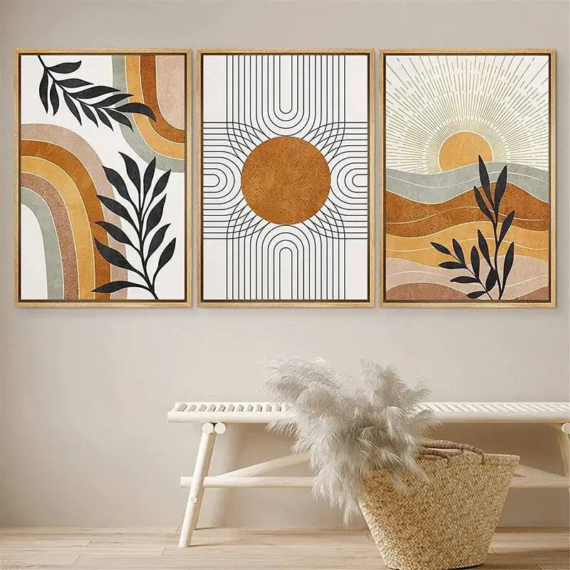 Set of three framed DecorBites desert plants wall art featuring black leaf silhouettes and geometric sun designs in earthy tones
