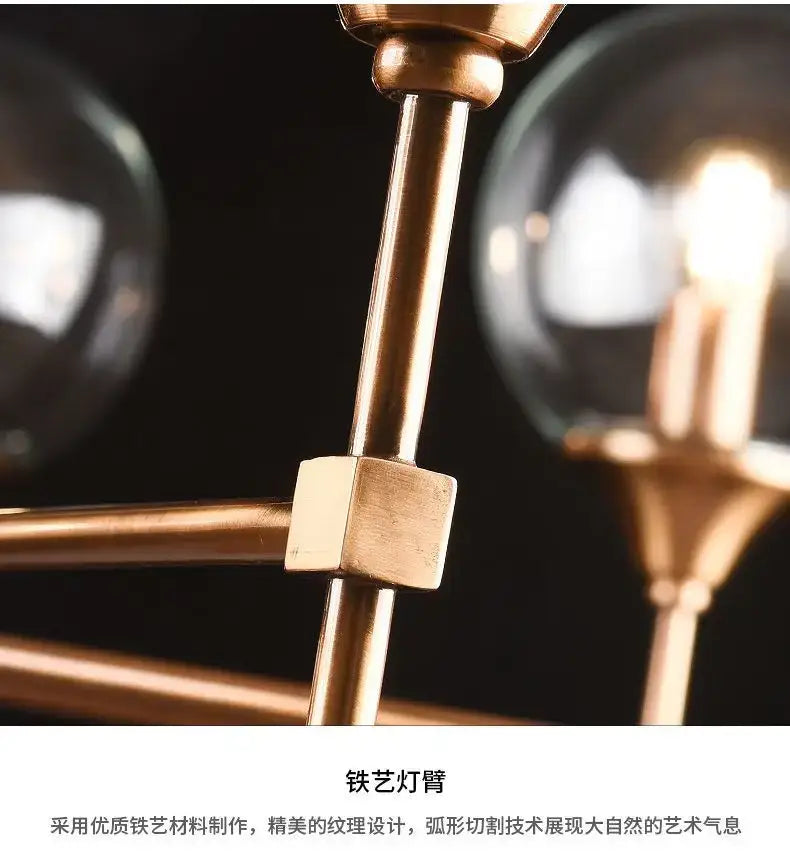 DecorBites™ designer metal chandelier with brass finish and polished spherical glass shades for modern living spaces