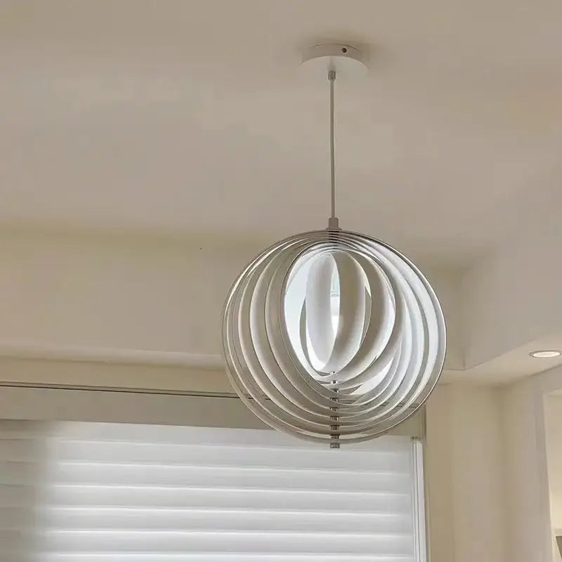Modern chrome-finished spherical pendant light with concentric ring design in decorbites designer moon led chandelier