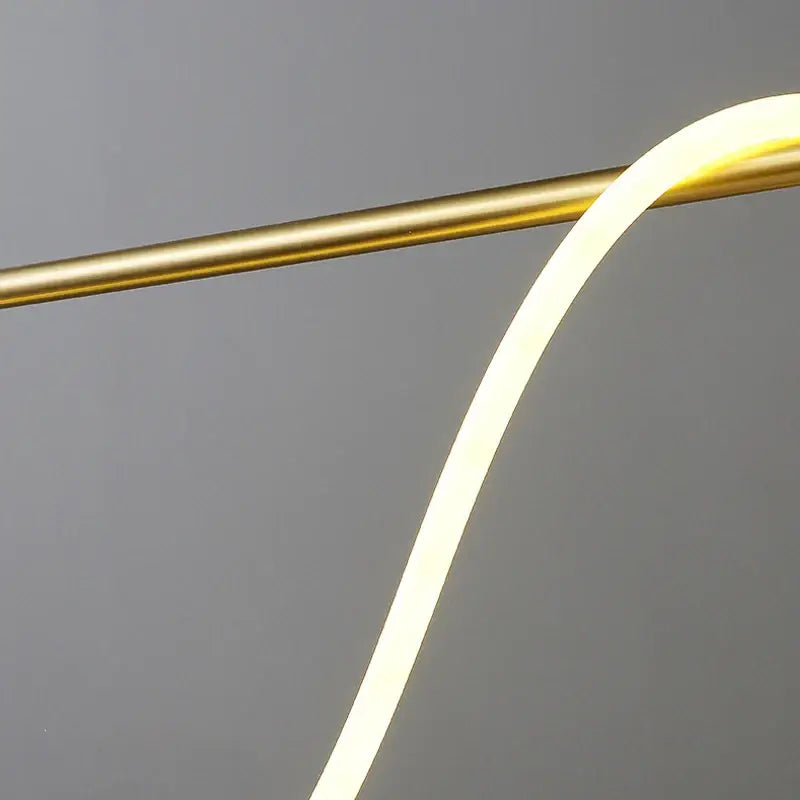 A decorbites™ dimmable nordic hose led ceiling chandelier with a sleek curved warm white led strip on polished brass rod