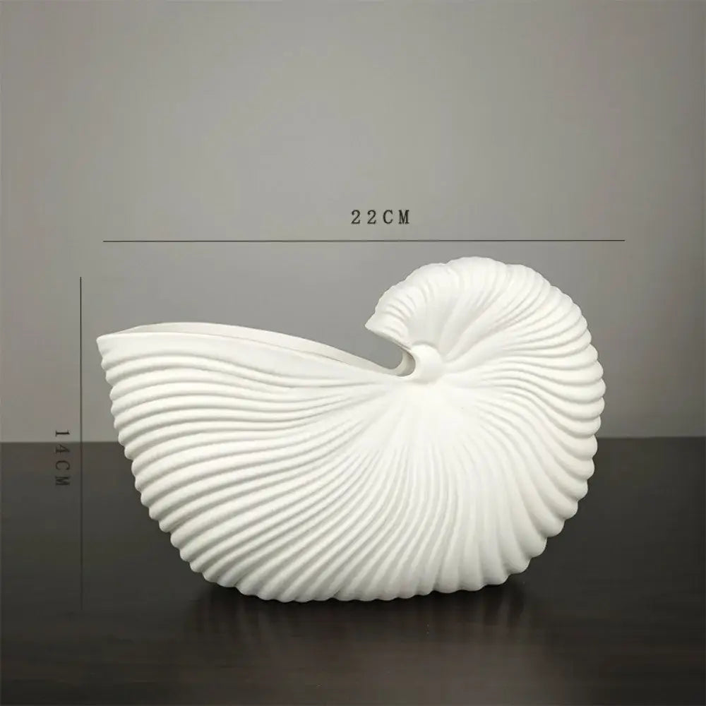 Decorbites™ elegant ceramic vase featuring a sleek white shell conch design, 22cm wide and 14cm tall