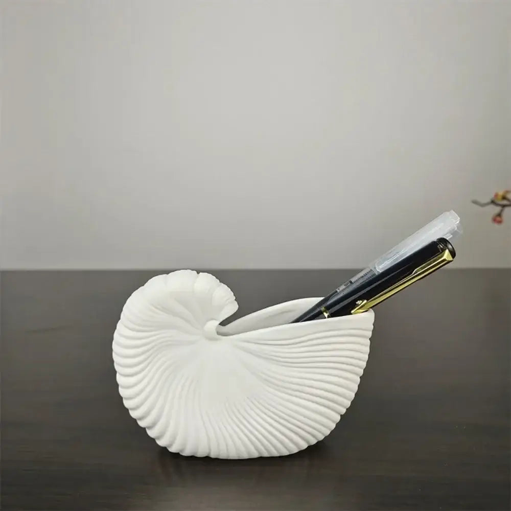 Decorbites™ elegant ceramic vase shell conch design in white with glossy finish and intricate ridged texture ideal as pen holder