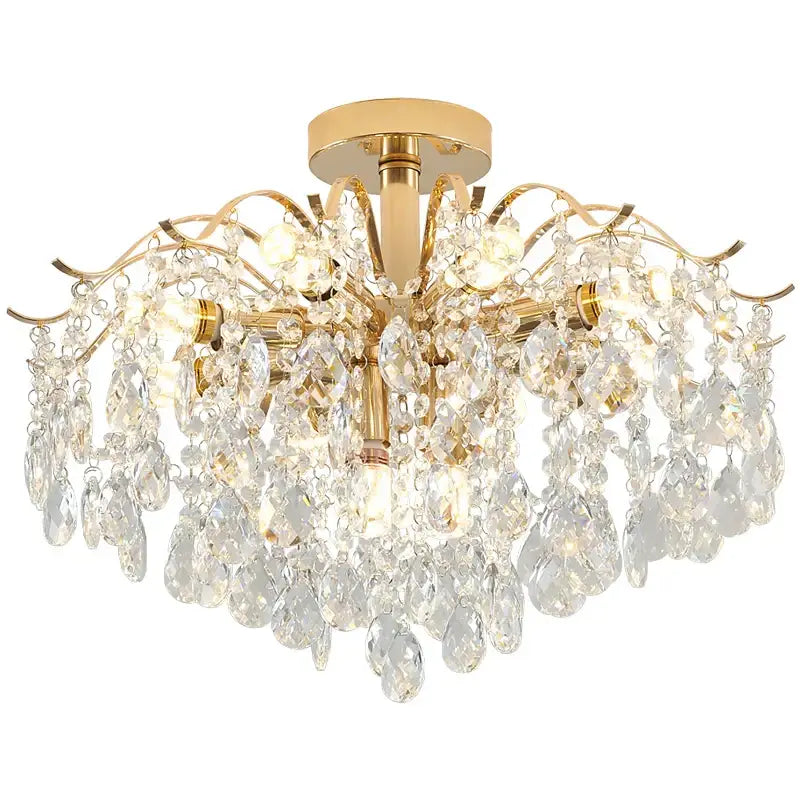 Decorbites elegant crystal chandelier gold finished with cascading teardrop crystals and ornate curved arms for dining room