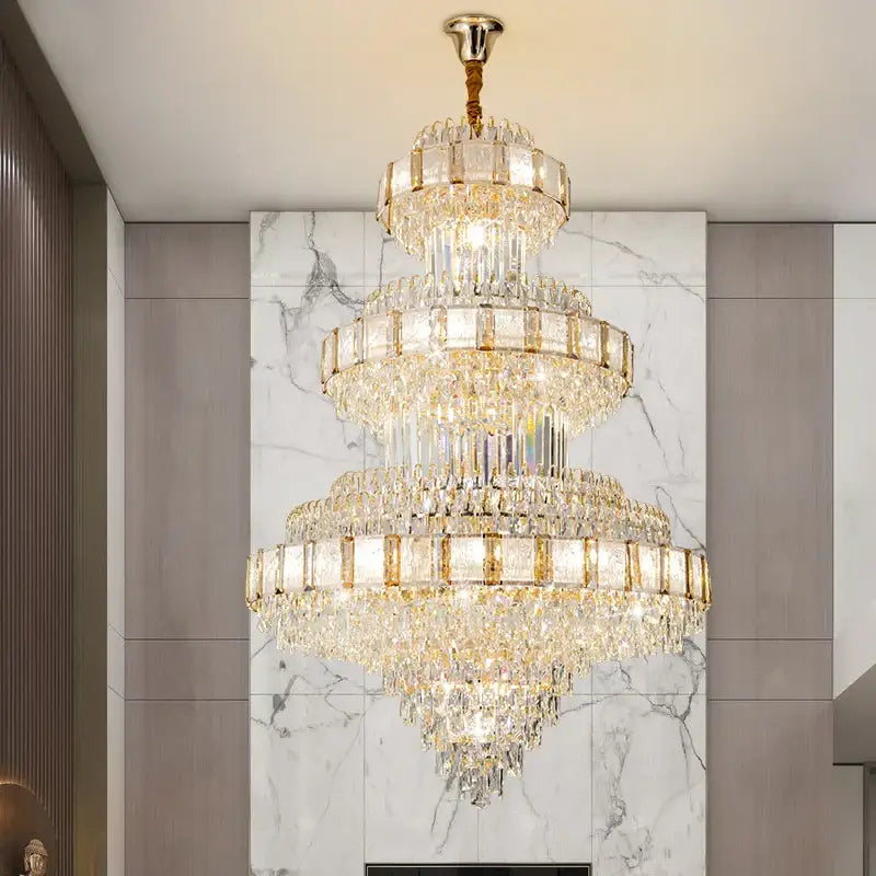 Decorbites elegant crystal multi-tiered chandelier with gold accents and cascading glass prisms for dining room decor