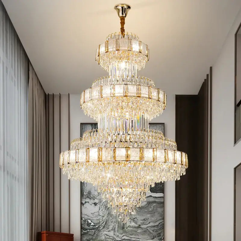 Decorbites elegant crystal chandelier with gold toned accents and cascading clear glass prisms for dining room use