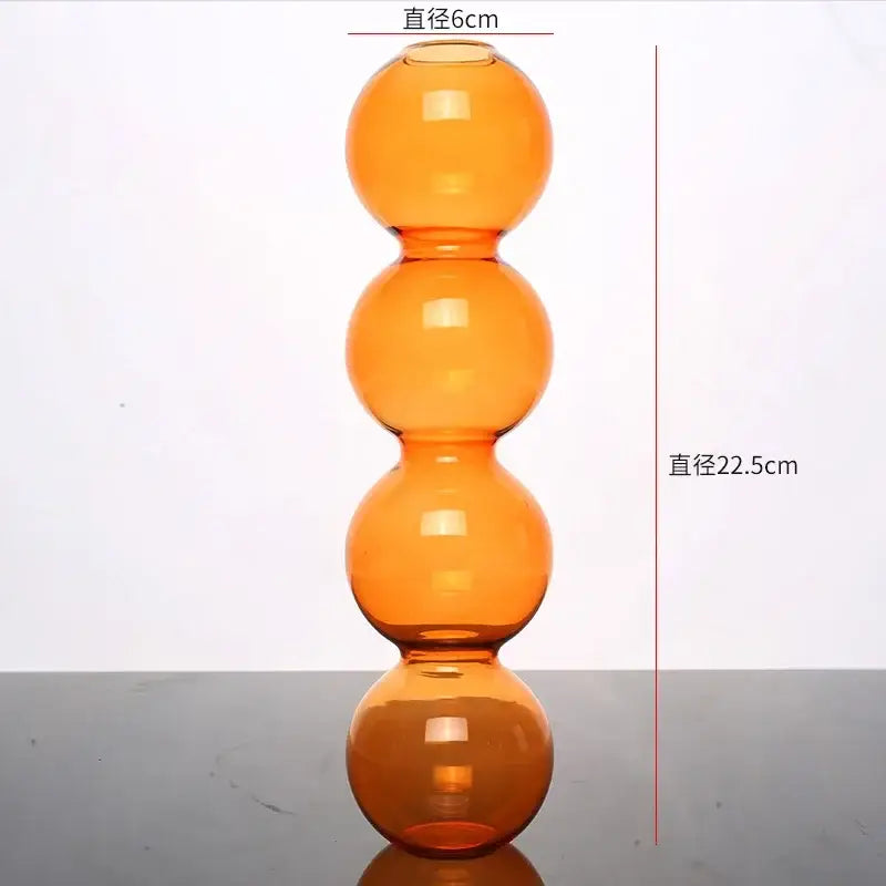 Tall amber glass vase with four stacked spherical sections elegant glass vase for home decor by DecorBites