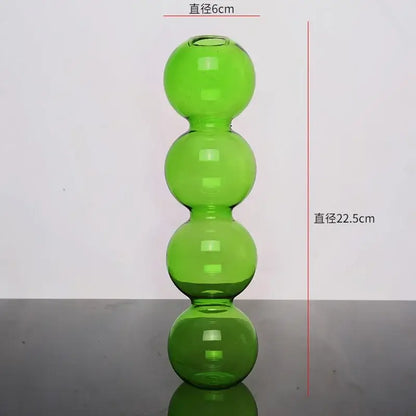 DecorBites™ elegant glass vase in translucent lime green with four stacked spherical sections for home decor