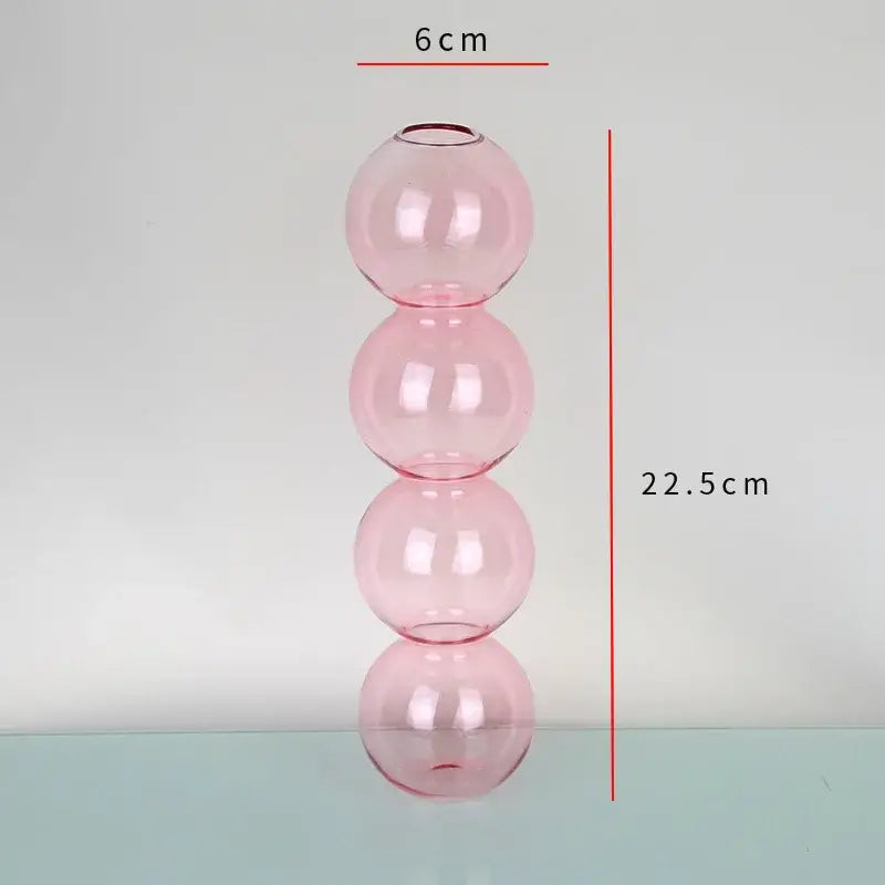 DecorBites™ elegant glass vase in translucent pink composed of four stacked spheres for stylish home decor