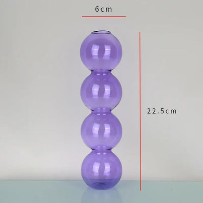 Decorbites elegant glass vase in translucent purple with four stacked spherical sections for home decor accent
