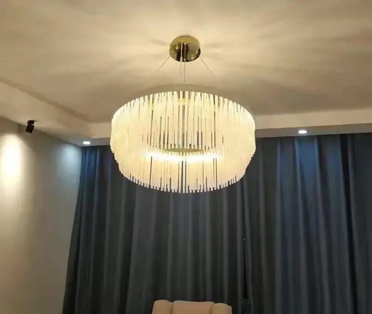 Decorbites™ elegant gold crystal chandelier with cascading clear crystal rods and modern gold luster ceiling mount