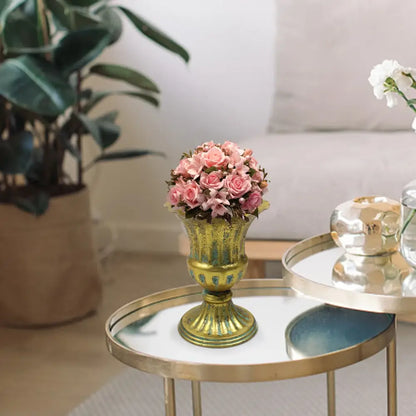 DecorBites™ elegant gold-toned metal flower vase with fluted detailing holding pink roses in a vintage style