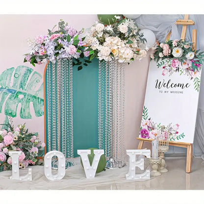 Teal and silver beaded wedding backdrop with floral arrangements featuring decorbites elegant metal vases for wedding decor