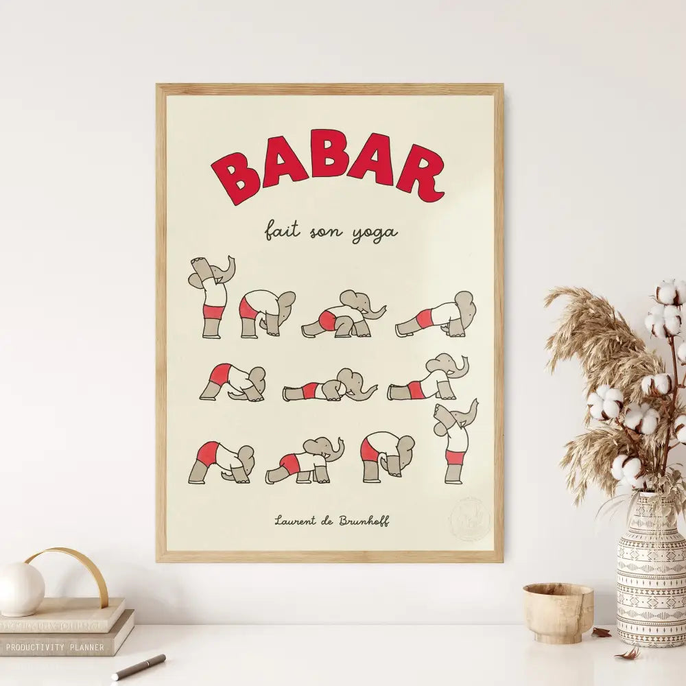 A framed cream poster of elephant babar family performing yoga in red and white attire for kids room decor