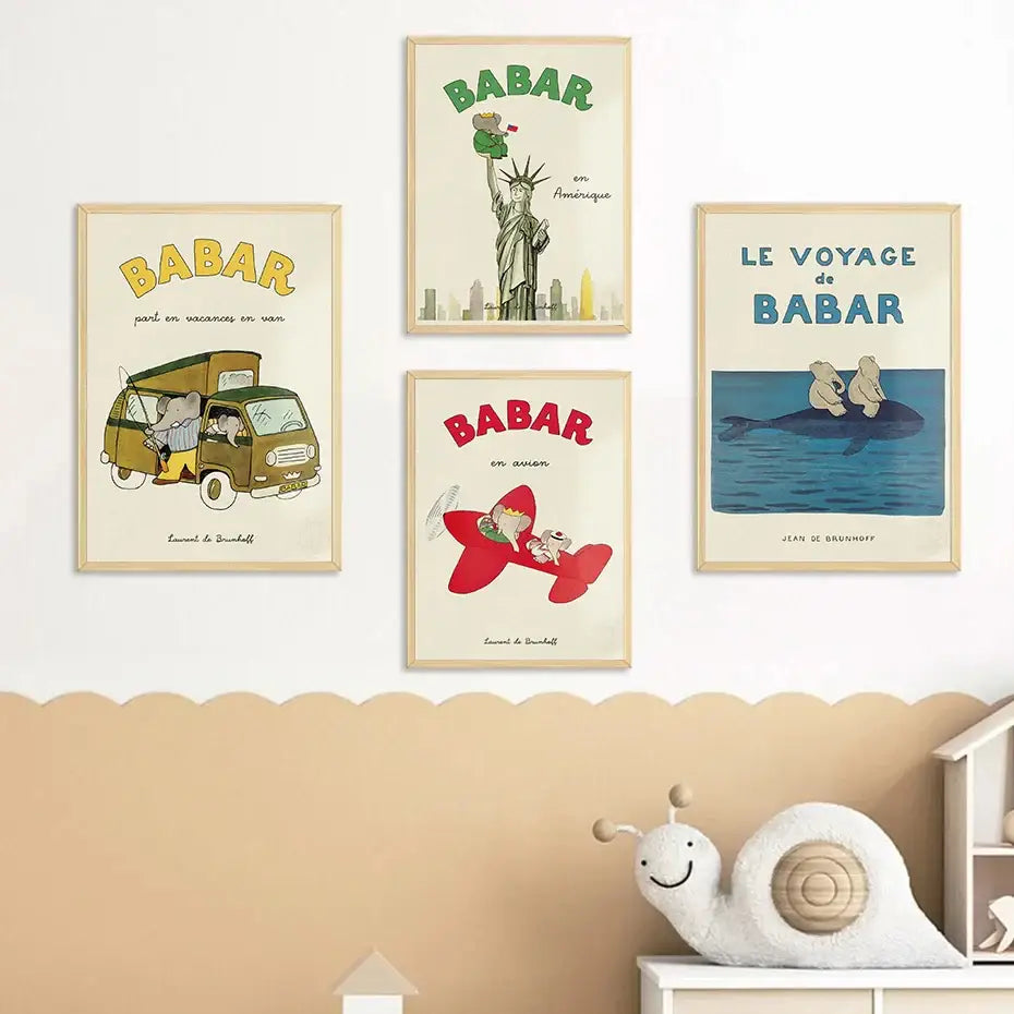 Four framed vintage-style babar children’s book posters in beige green red and blue tones for kids room decor featuring elephant family yoga