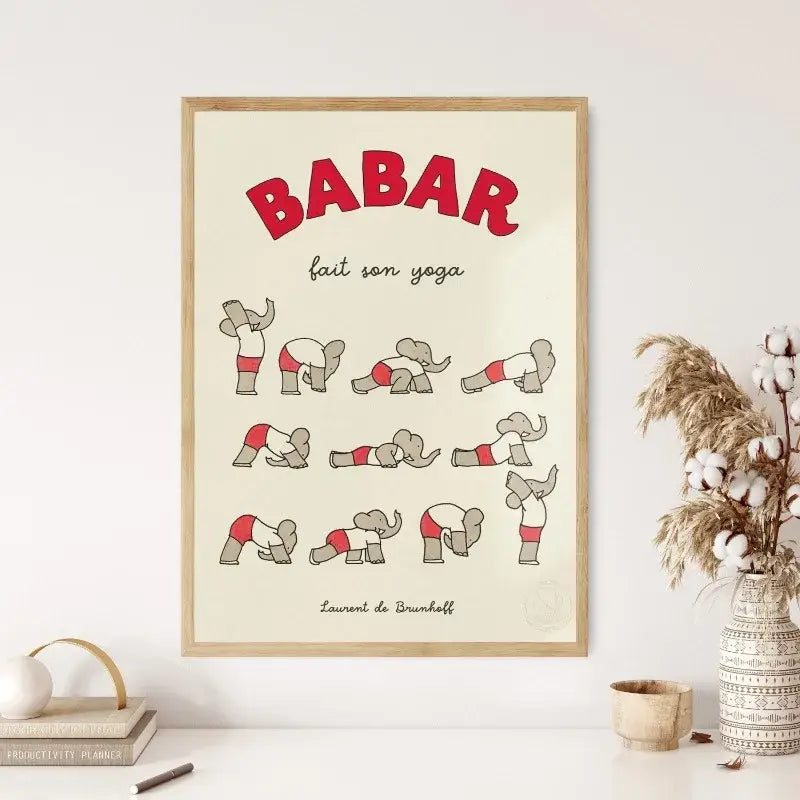A framed DecorBites™ elephant family yoga poster with red and gray cartoon elephants for kids room decor