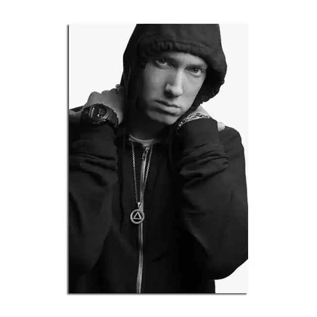 Black-and-white decorbites™ eminem poster print featuring music star in hooded jacket and layered necklaces for wall art