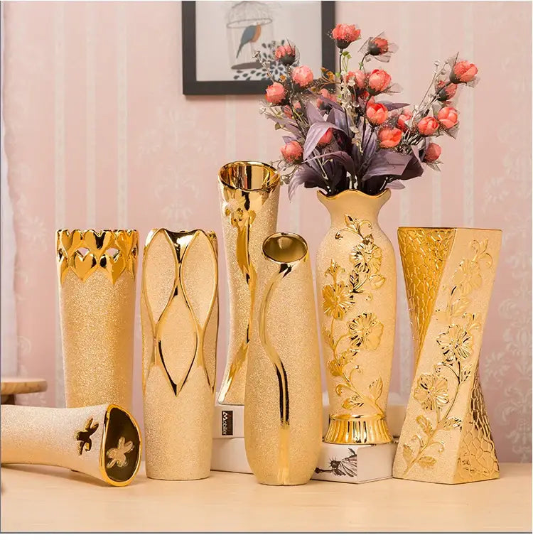 A collection of decorbites™ europe gold-plated ceramic vases with intricate floral and geometric designs for home decor