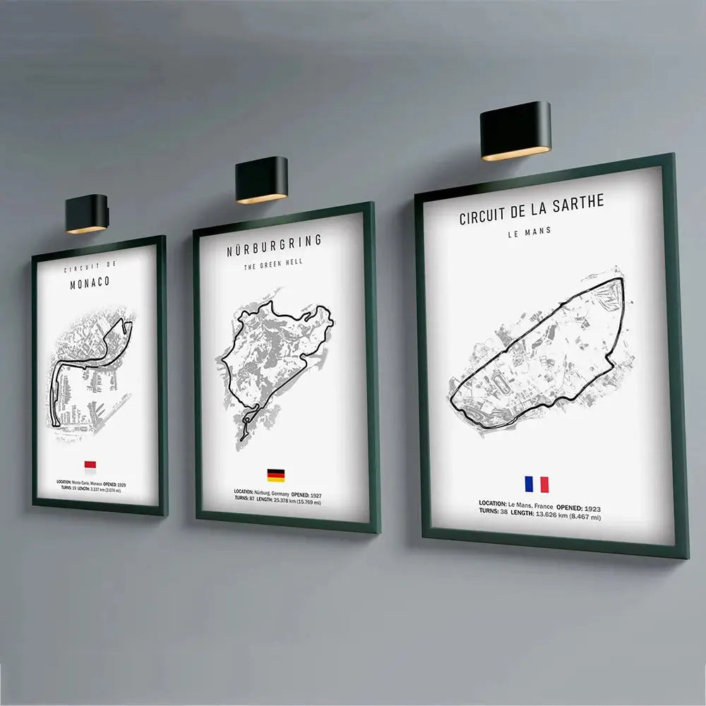 Three framed black and white f1 circuit canvas paintings in dark green frames for motorsport wall art decor by decorbites