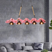 Rustic industrial factory conical island pendant light with five dark brown metal shades and pink cherry blossoms
