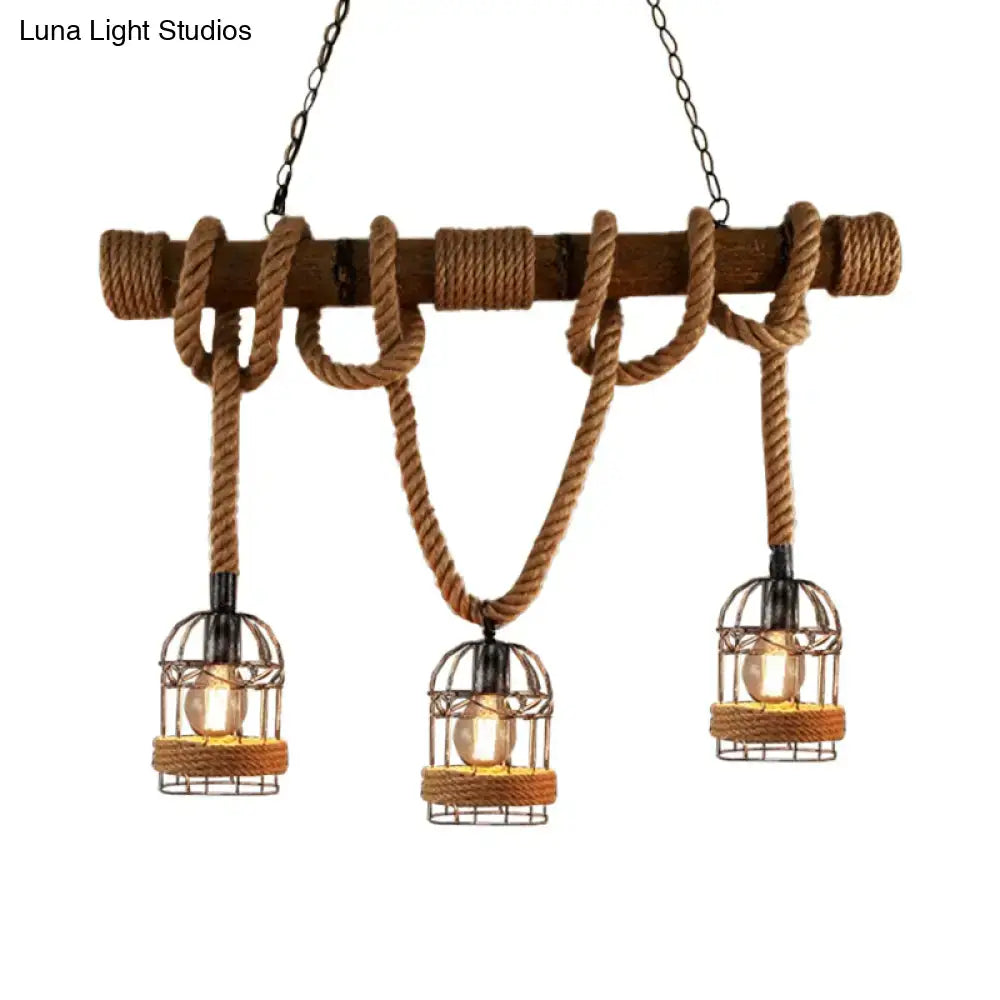 Rustic farmhouse chandelier featuring brown iron bird cage pendant lights with rope and wood pole accents
