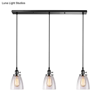 Decorbites farmhouse pendant light with black metal linear canopy, three clear glass ribbed shades, and exposed bulbs