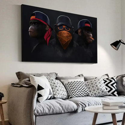 Black canvas monkey wall art featuring three hip-hop style monkeys with caps and bandanas smoking a cigar