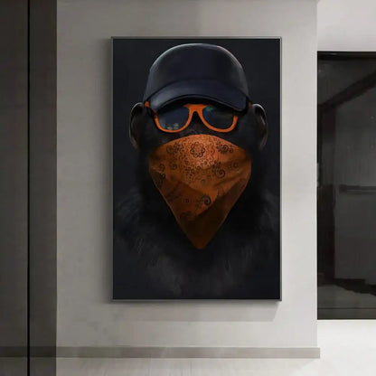 A framed canvas print of monkey wall art featuring a black monkey with an orange bandana and sunglasses by decorbites