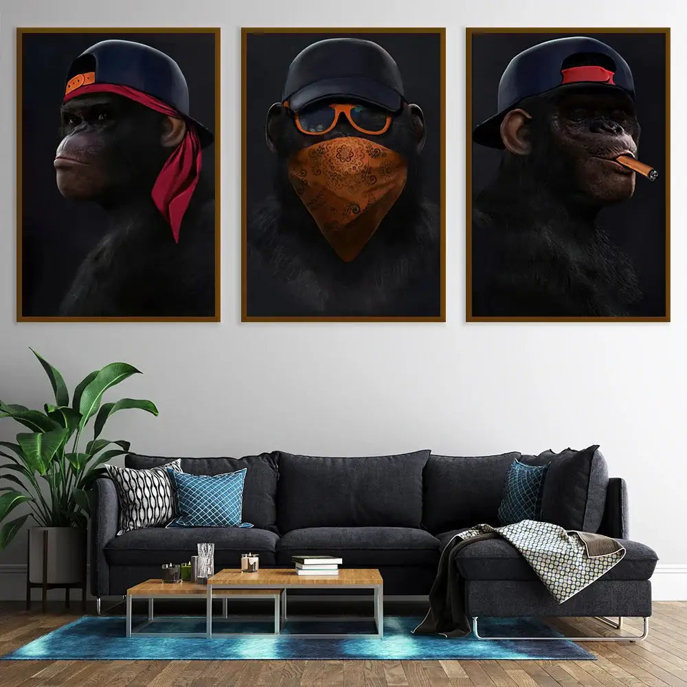 Set of three framed monkey wall art featuring chimpanzees in stylized urban streetwear for premium decor