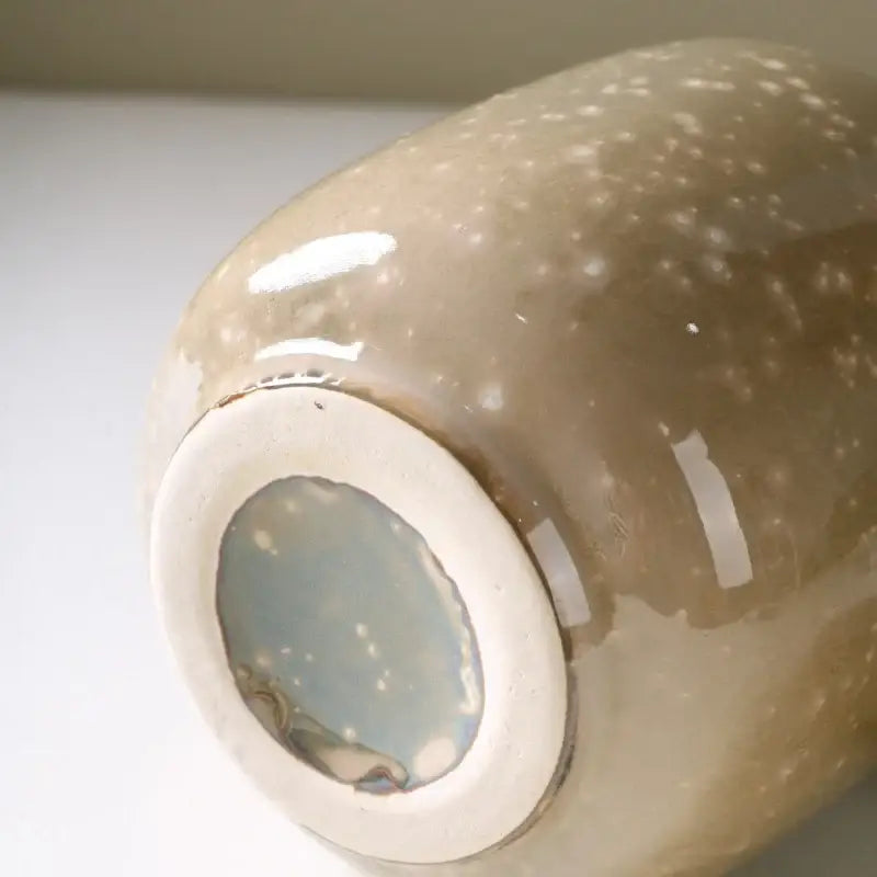 Beige decor ceramic vase with speckled glaze and white circular base from decorbites 13.5cm high ceramic vase
