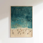 A framed wooden DecorBites™ wall art depicting people swimming in turquoise water and sandy shore summer scene
