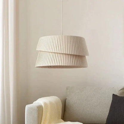 Beige pleated tiered pendant lamp with soft textured fabric finish from decorbites french cream chandelier collection