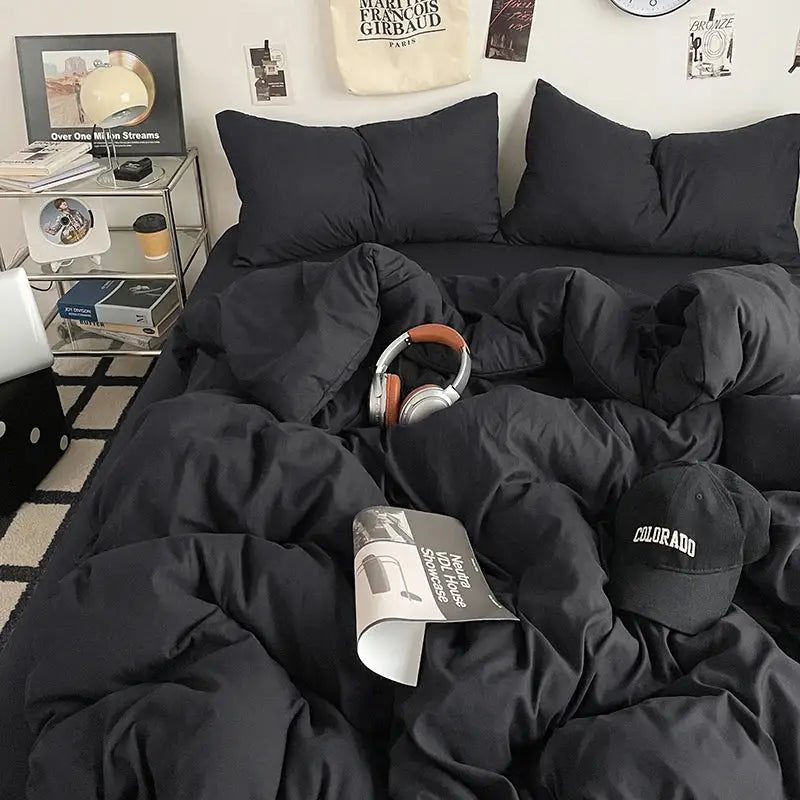 Black quilted comforter with plush texture and subtle sheen in decorbites™ fresh solid color cotton quilt set