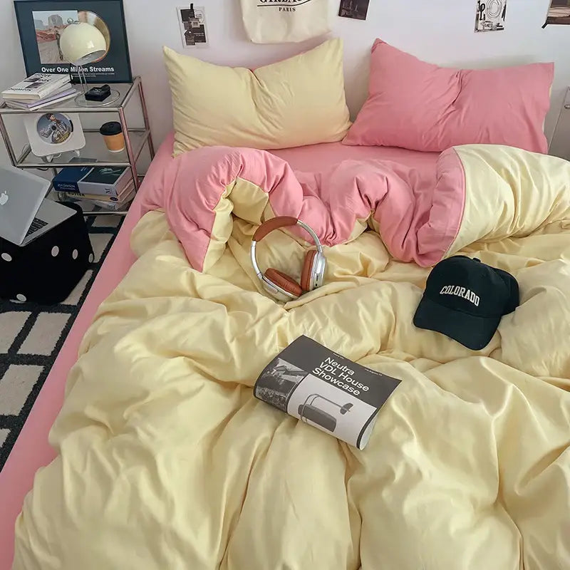 Decorbites fresh solid color cotton quilt set features a pink and yellow two-tone quilted comforter set