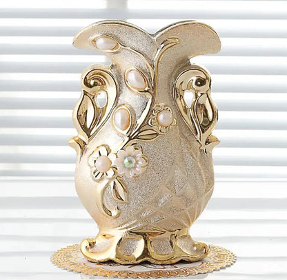 Gold-toned frosted porcelain flower vase with ornate floral embellishments and pearl accents for home decor