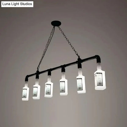 Black industrial chandelier with five illuminated clear glass whiskey bottles on metal pipe frame frosted white glass accent