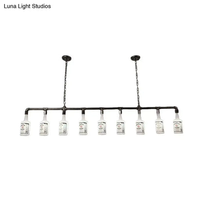 Industrial-style black pipe chandelier with ten clear glass jack daniels bottles and frosted white glass accents for loft lighting