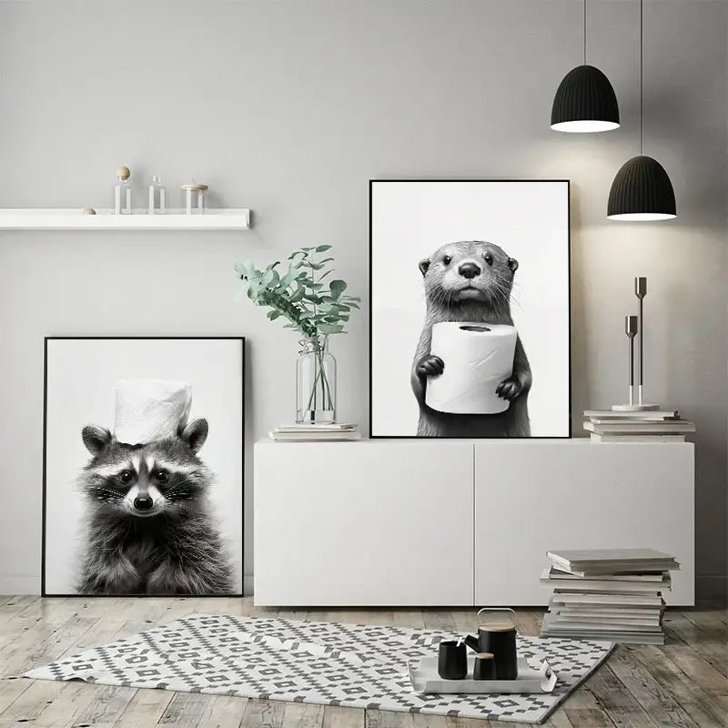 Black and white framed wall art of a funny otter holding toilet paper for bathroom home decorbites canvas