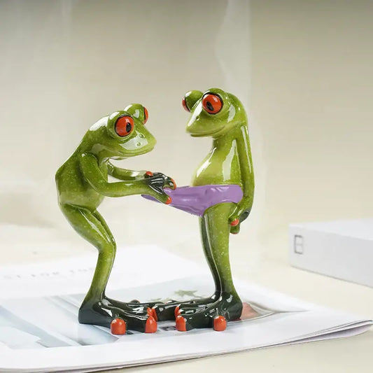 Decorbites funny frog couple resin figurine featuring green frogs with red eyes and one in a purple diaper