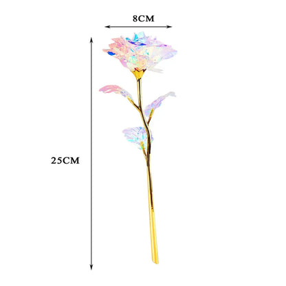 A 25cm tall decorbites galaxy rose wedding centerpiece with golden stem and iridescent blue and purple crystal petals