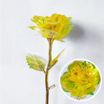 A translucent yellow galaxy rose with golden glass stem and leaves by decorbites galaxy for wedding centerpiece