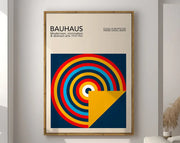 DecorBites™ geometric bauhaus canvas poster with bold red yellow and blue concentric circles on navy for home decor