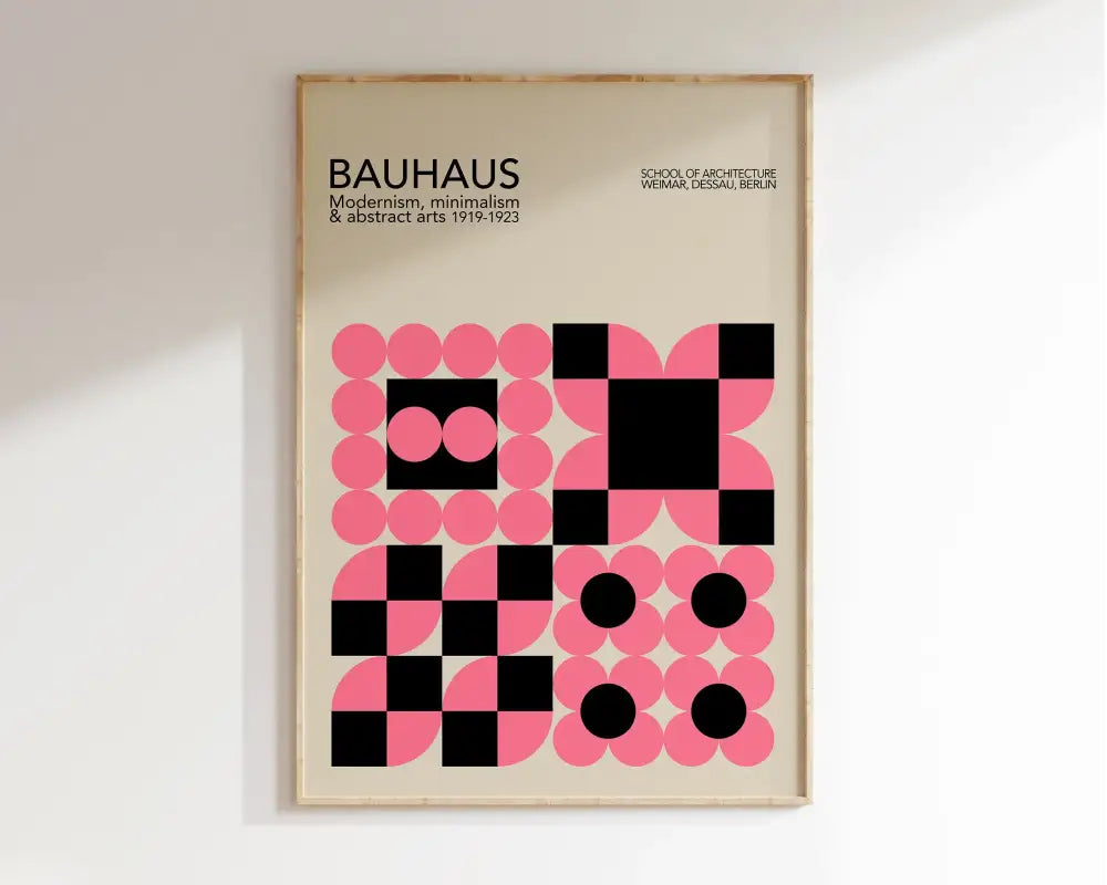 A framed decorbites™ geometric bauhaus canvas poster with pink and black circles on an off-white background