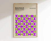A framed DecorBites™ geometric bauhaus canvas poster with purple and olive half-circles for modern home decor wall art
