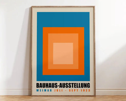 Decorbites™ geometric bauhaus canvas poster featuring blue orange and peach concentric squares with bold black text