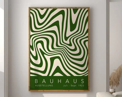 A framed decorbites™ geometric canvas poster with bold green and cream wavy lines in a light wood frame