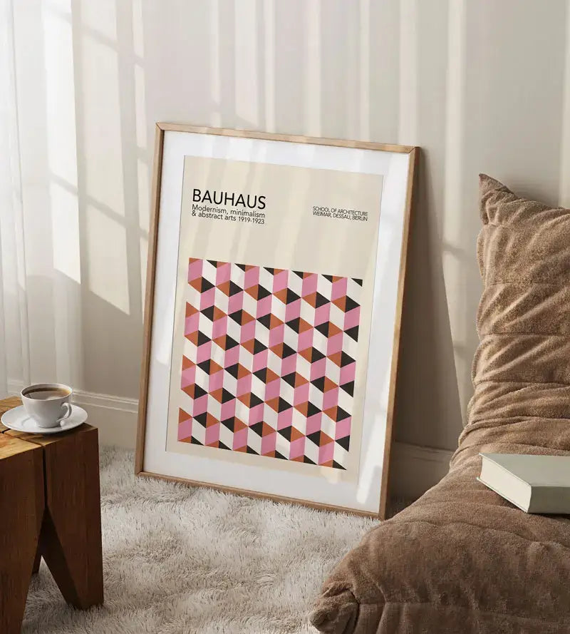 A framed decorbites™ geometric bauhaus canvas wall art with pink black and beige geometric bauhaus pattern