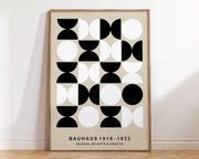 Decorbites™ geometric canvas poster featuring a minimalist bauhaus-inspired black and white pattern in a light wood frame