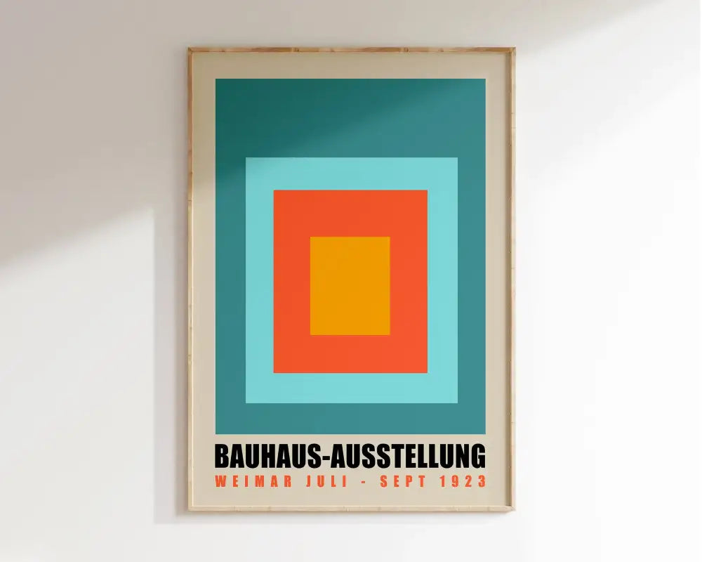 A framed DecorBites™ geometric canvas poster with teal, light blue, orange, and yellow concentric squares for mid century home decor