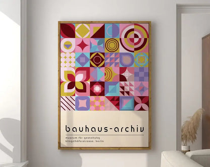 A framed decorbites geometric canvas poster with vibrant bauhaus style colorful abstract shapes on cream background