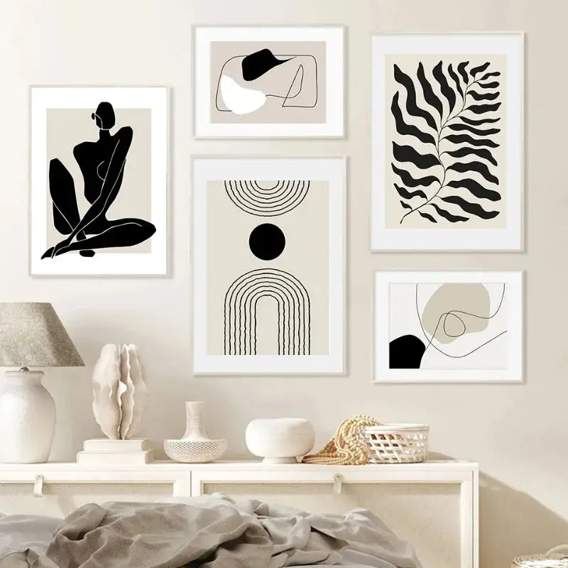 Set of five DecorBites™ boho canvas prints with black and beige geometric leaf rainbow shapes in white frames